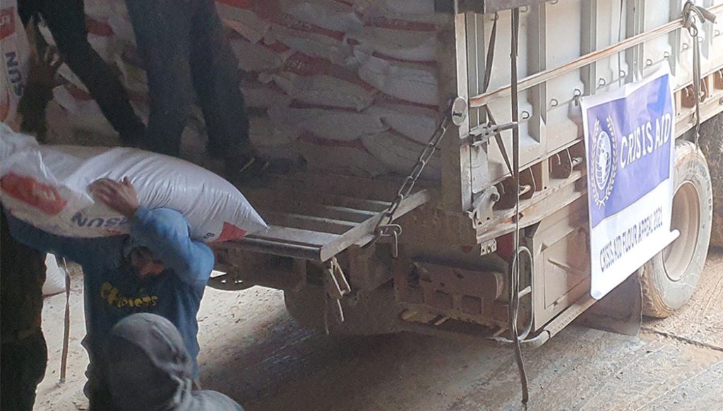 a man loading a truck