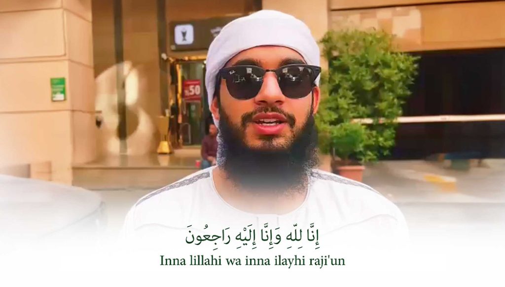 Person expressing condolences outdoors.